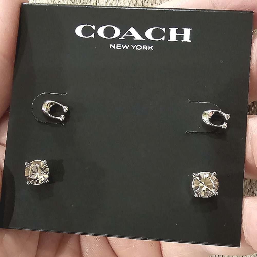 NWT Coach Earrings: 2 pair, CC and sparkle. Comes with care book.